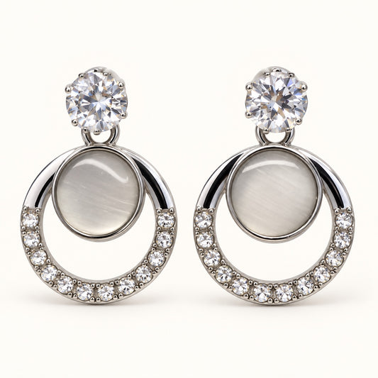 Front view of Argent Opaline Orbit Drops showing the crystal-edged round frame