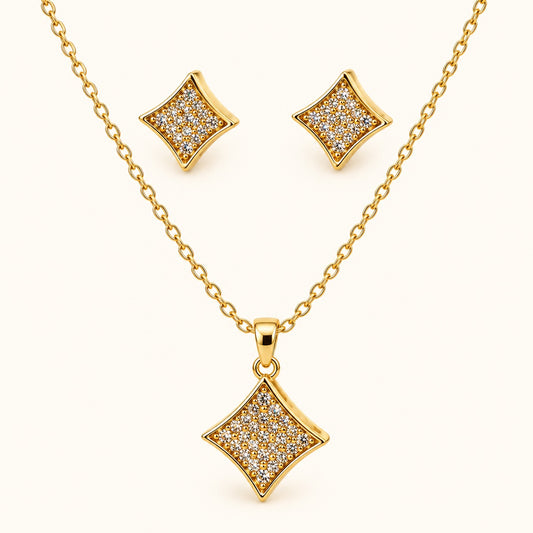 Front view of gold-tone pavé rhombus pendant necklace with matching stud earrings