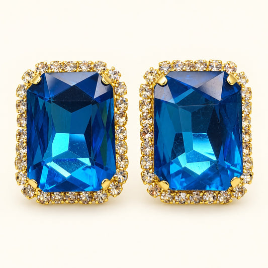 Front view of Regal Ocean Blue Halo Studs showing the crystal halo and ocean blue centre stone