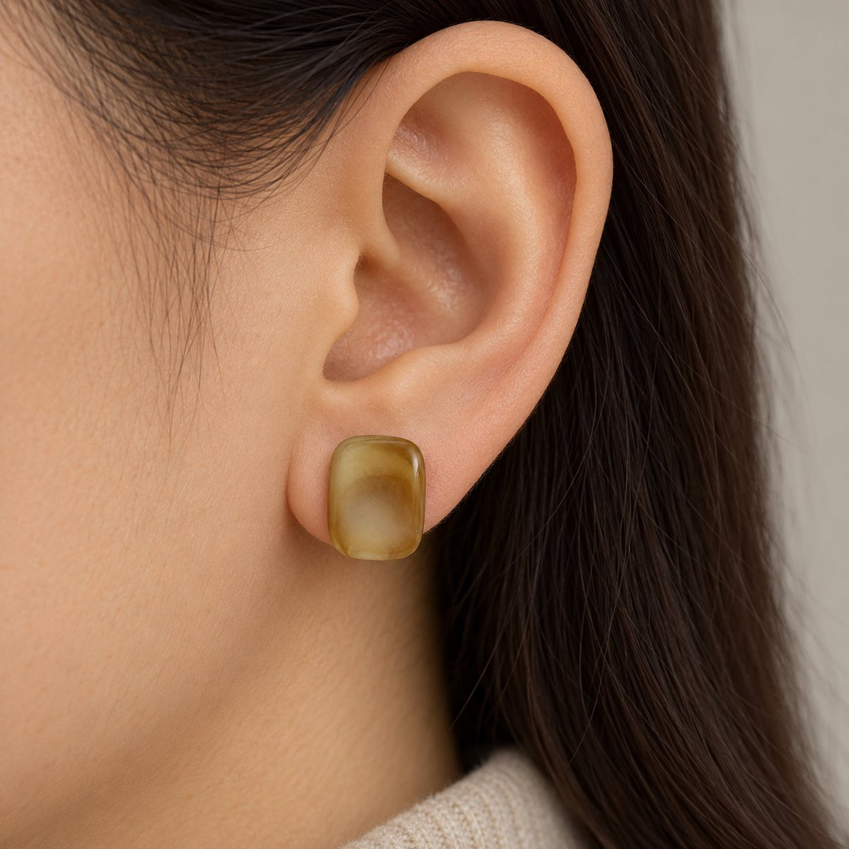 Model wearing Amber Glow Cabochon Studs cushion cabochon stud earrings