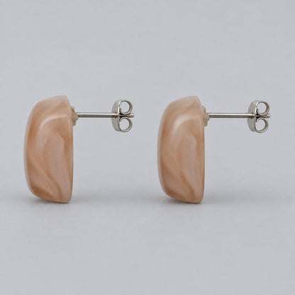 Side view of Apricot Blush Cabochon Studs showing the domed profile and push-back post