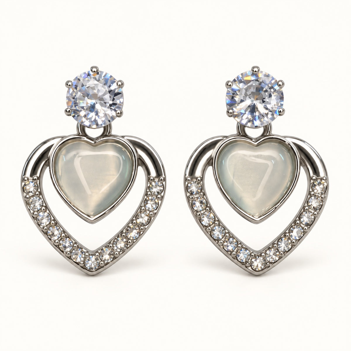 Front view of Argent Opaline Heart Drops showing the crystal-edged heart frame