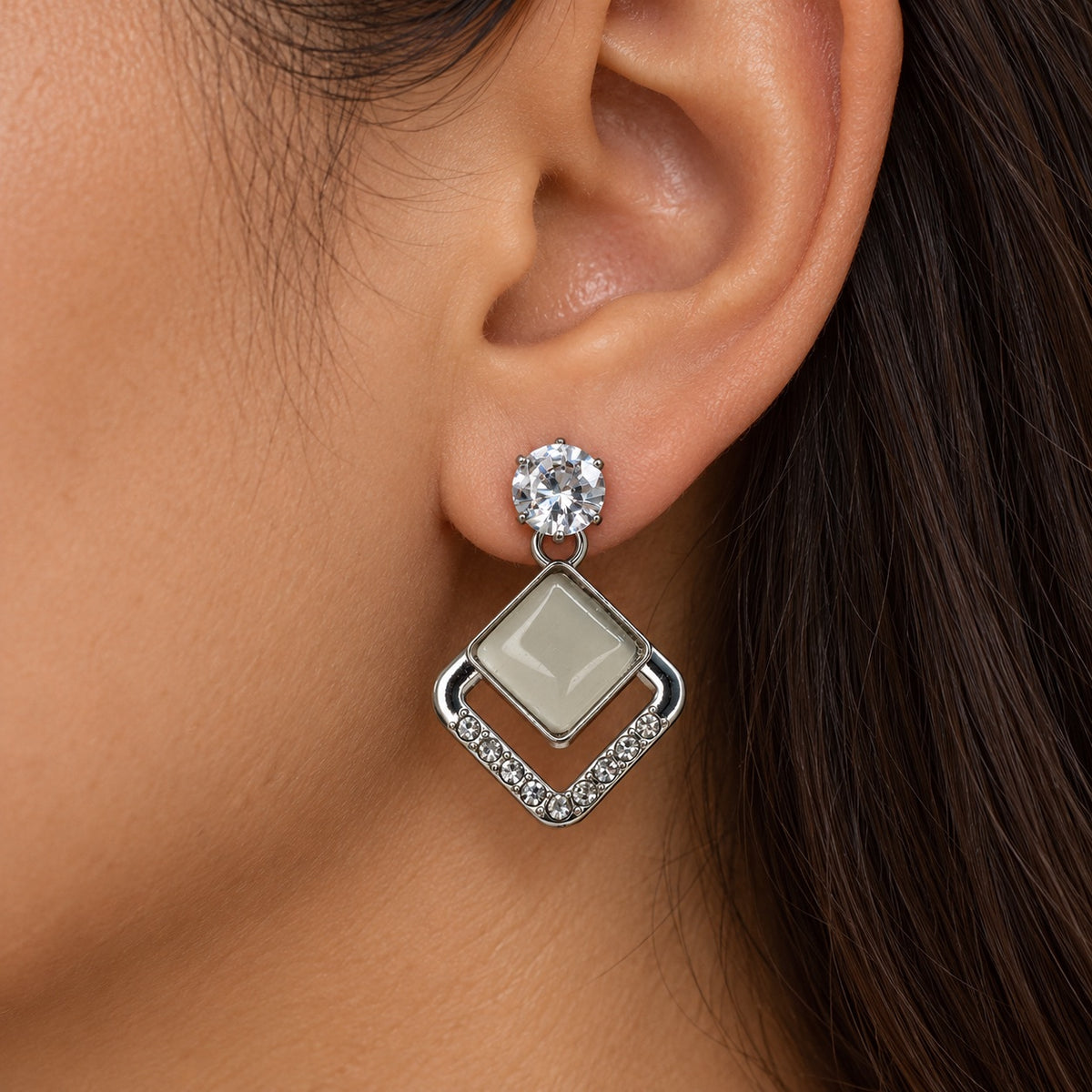 Model wearing Argent Opaline Rhombus Drops silver-tone drop earrings