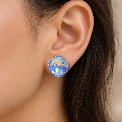 Model wearing Aurora Blue Crystal Studs iridescent stud earrings