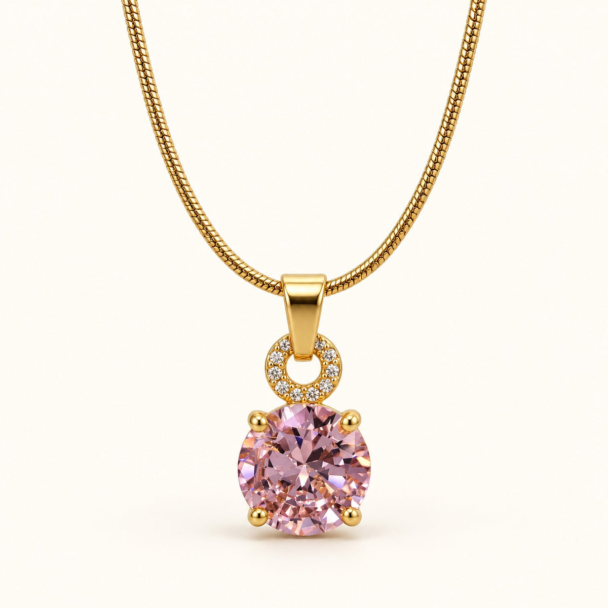 Front view of blush pink solitaire pendant necklace with crystal halo bail