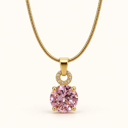 Front view of blush pink solitaire pendant necklace with crystal halo bail