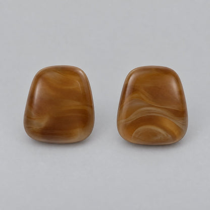 Front view of chestnut marbled cushion cabochon stud earrings