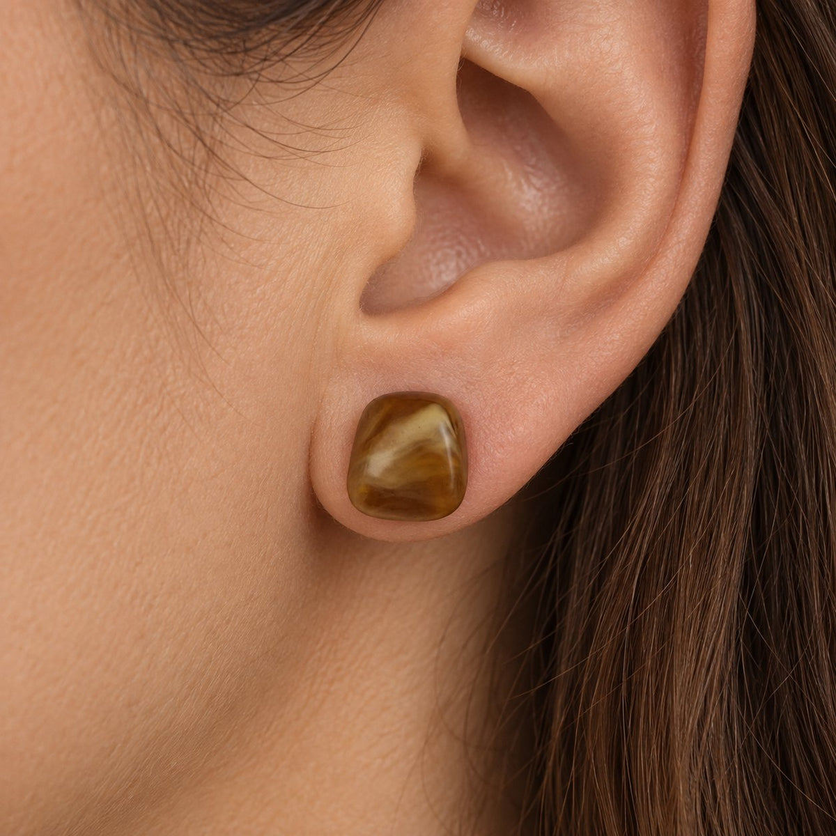 Model wearing Cognac Cabochon Studs amber stud earrings