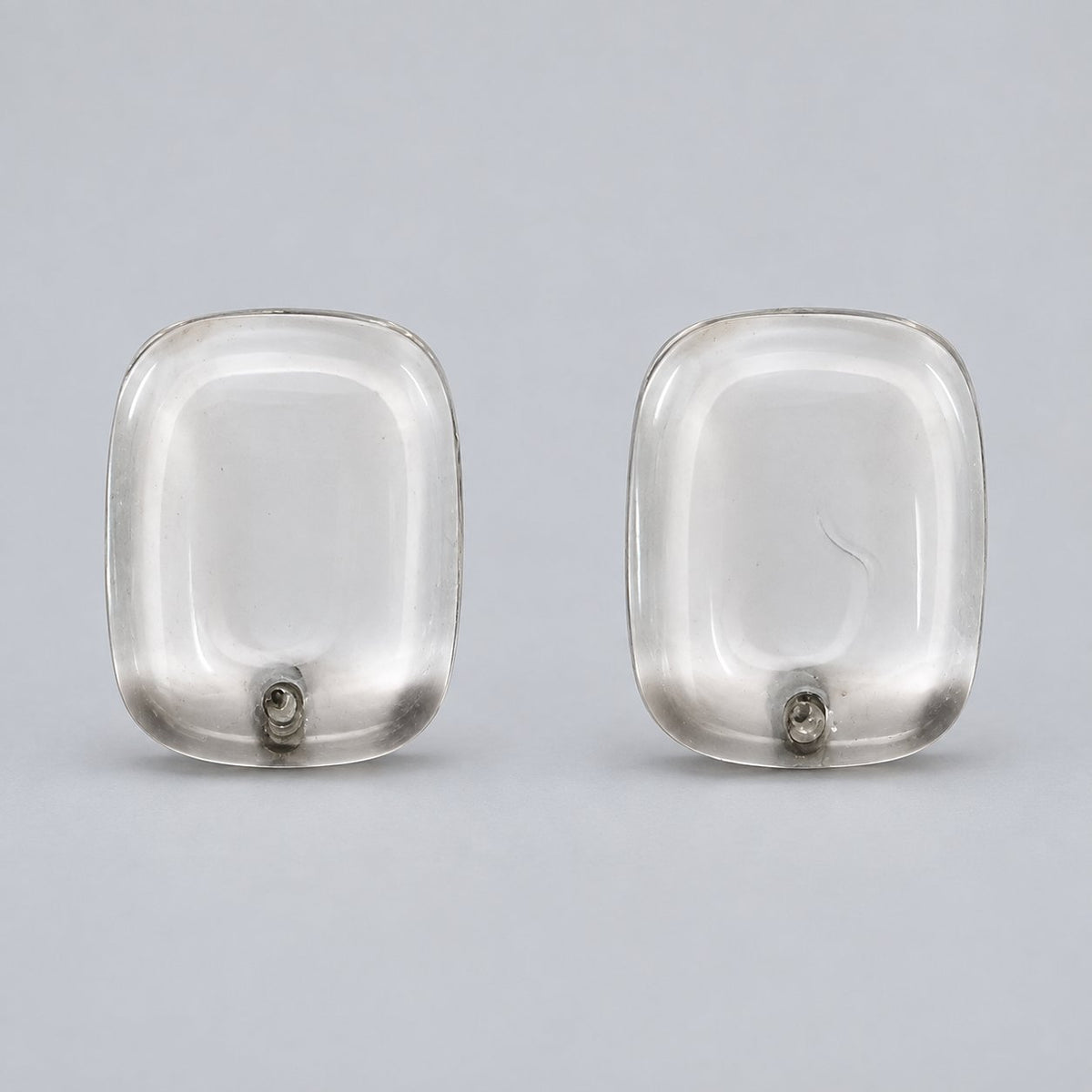 Front view of crystal clear cushion cabochon stud earrings