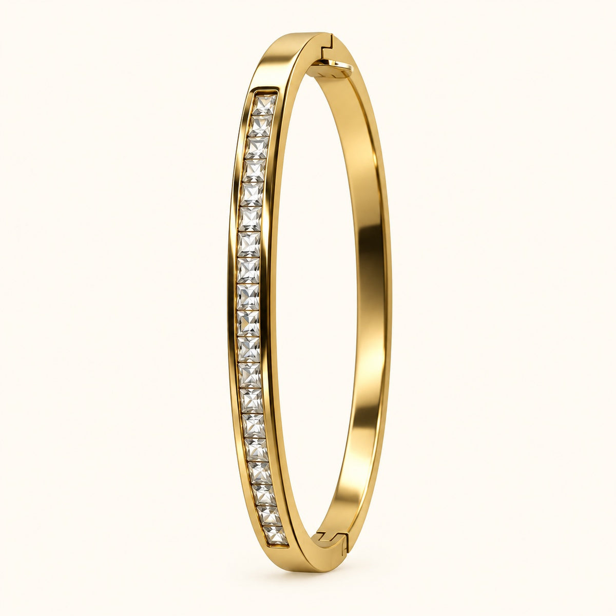 Side view of gilded channel-set CZ bangle showing the hinge and slim profile