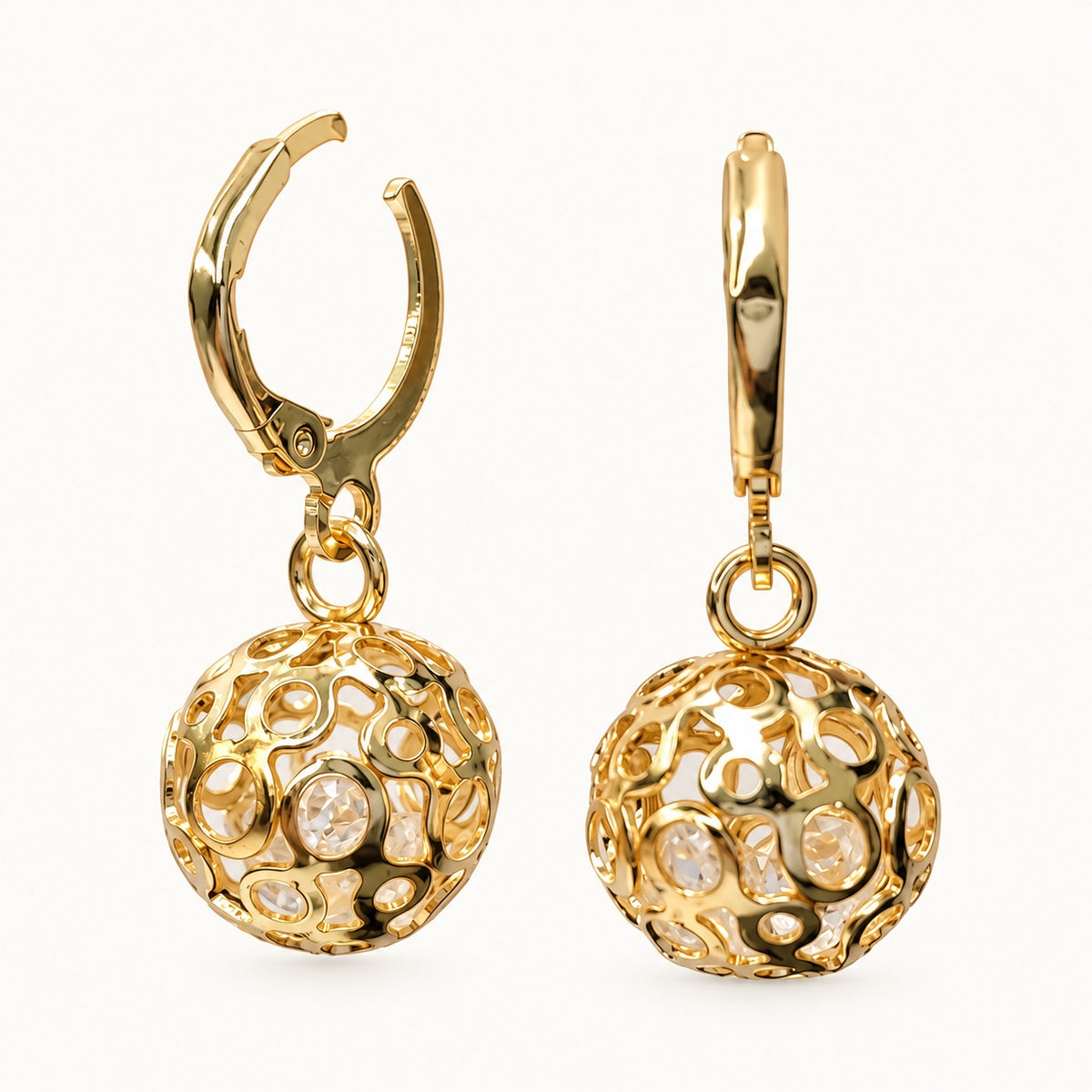 Side view of Gilded Filigree Orb Huggie Drops gold-tone filigree orb huggie drop earrings