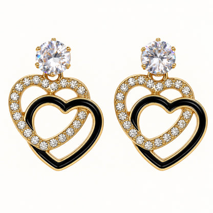 Front view of Gilded Noir Heart Drops gold-tone heart drop earrings