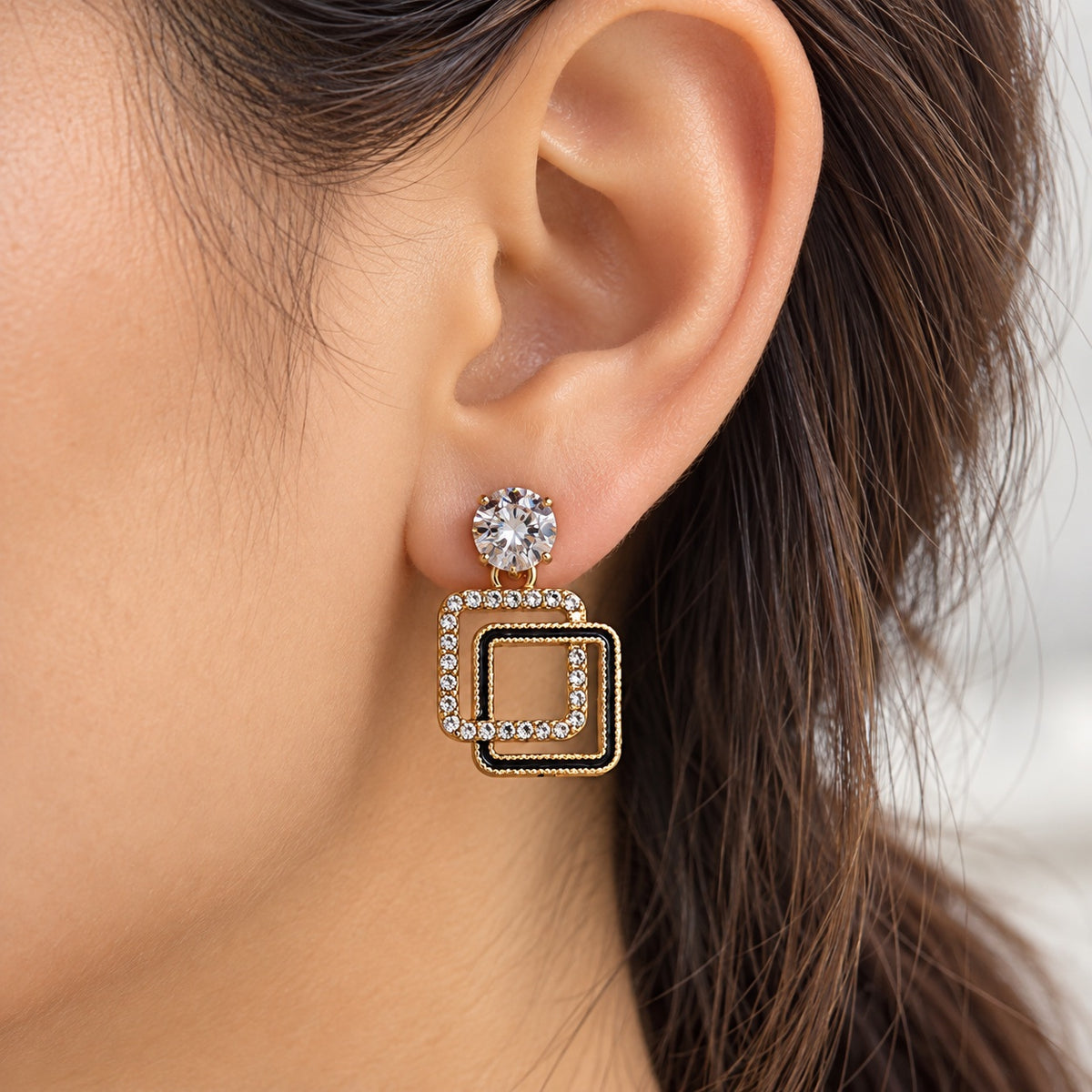 Gilded Noir Square Drops gold-tone square drop earrings worn on model