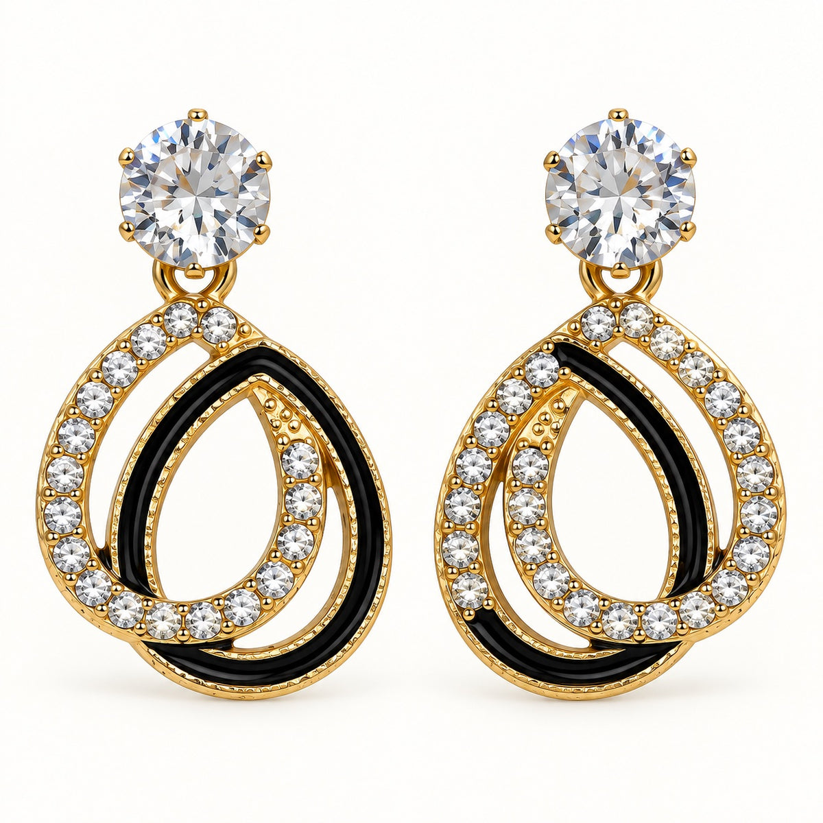 Front view of Gilded Noir Teardrop Earrings gold-tone teardrop earrings