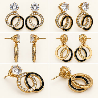 360 degree view of Gilded Noir Twin Orbit Drops gold-tone twin orbit drop earrings
