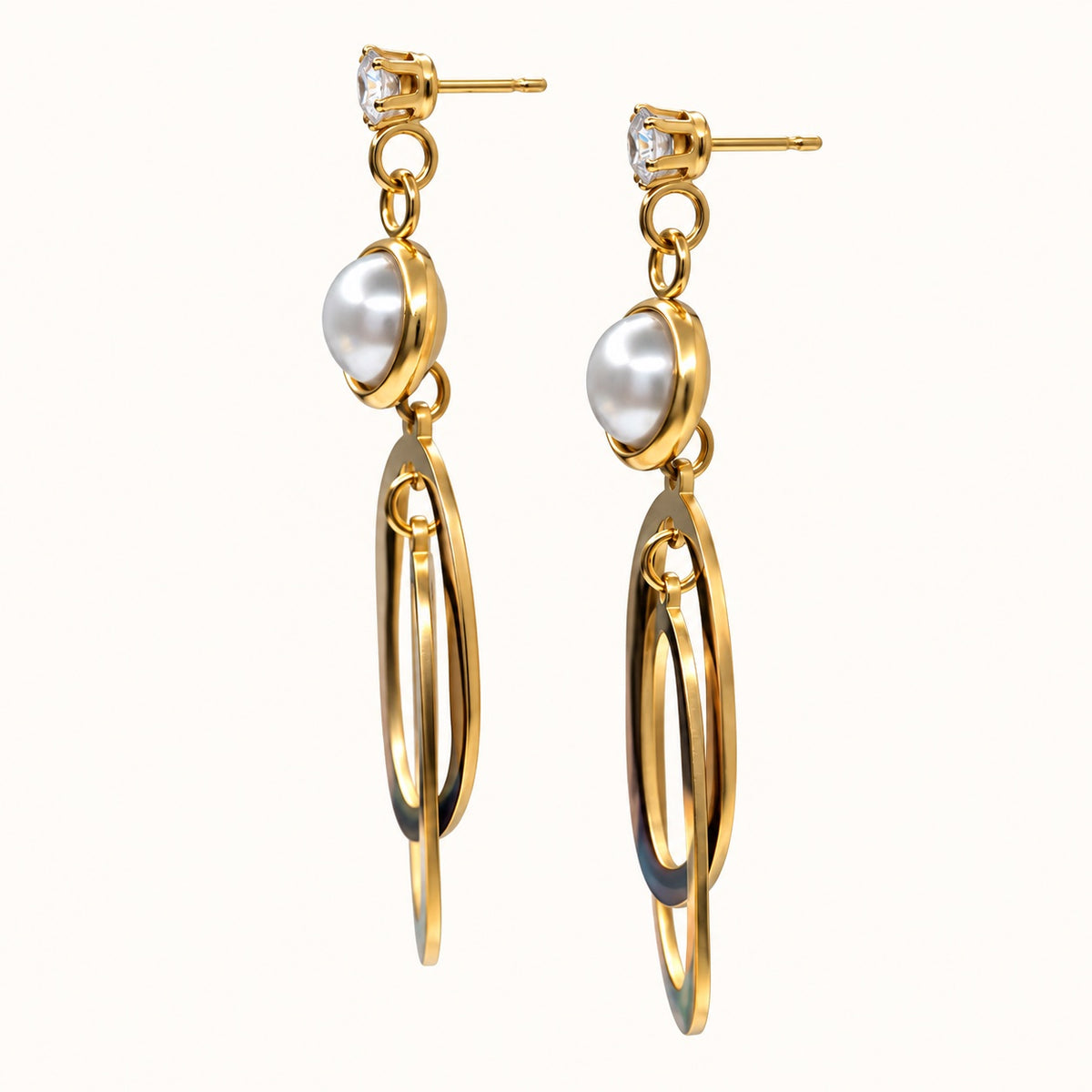 Side view of Gilded Pearl Oval Loop Drops gold-tone pearl oval loop drop earrings