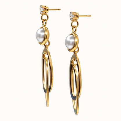 Side view of Gilded Pearl Oval Loop Drops gold-tone pearl oval loop drop earrings