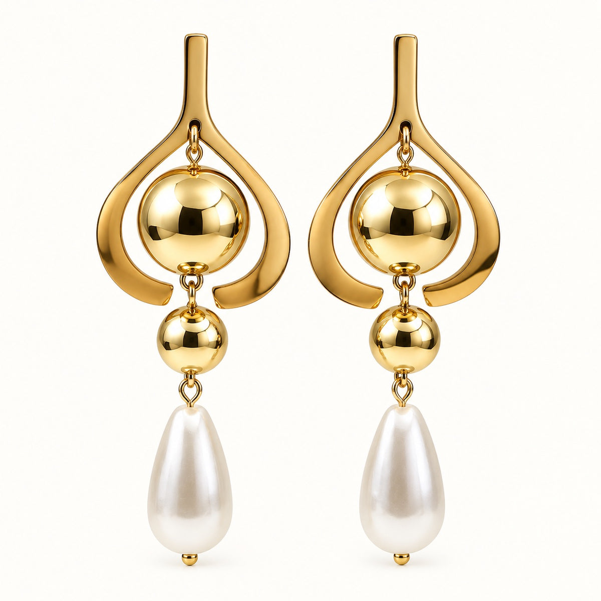Front view of Gilded Pearl Teardrop Chandeliers gold-tone pearl teardrop chandelier earrings
