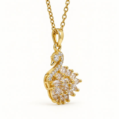 Side view of the swan pendant showing the polished bail and chain link