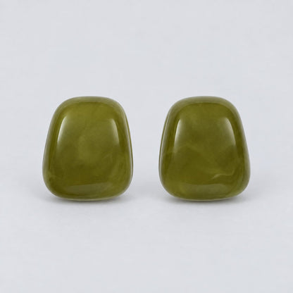 Front view of the moss green cabochon stud earrings