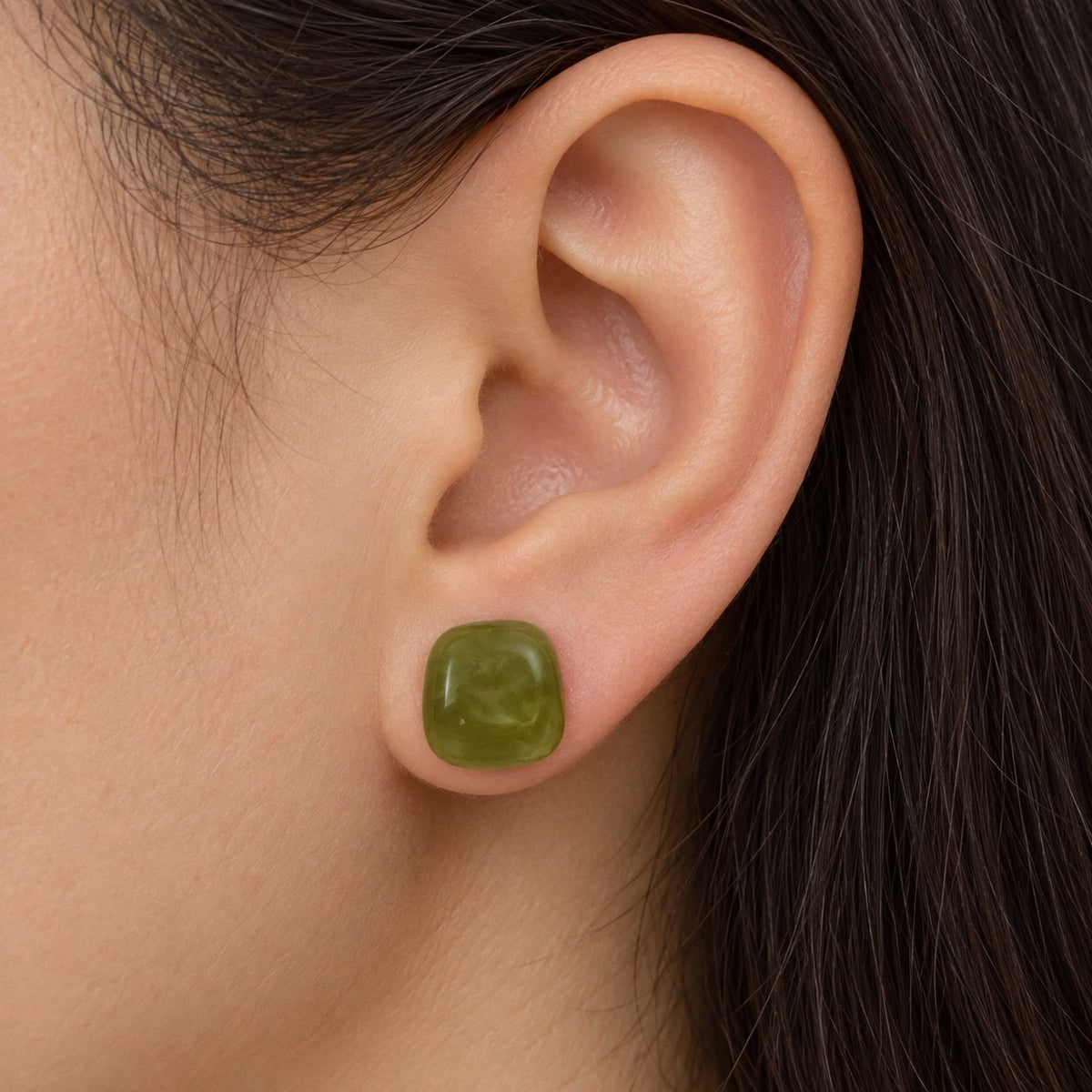 Model wearing the Moss Green Cabochon Studs