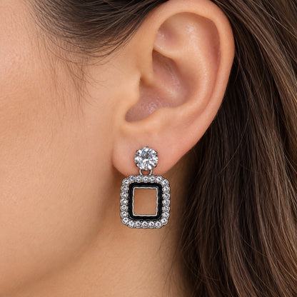 Model wearing the Noir Square Halo Drops
