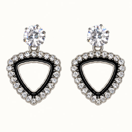 Front view of silver-tone trillion halo drop earrings with cubic zirconia studs and black enamel