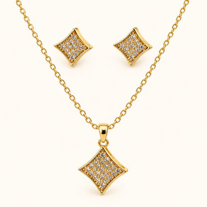 Front view of gold-tone pavé rhombus pendant necklace with matching stud earrings