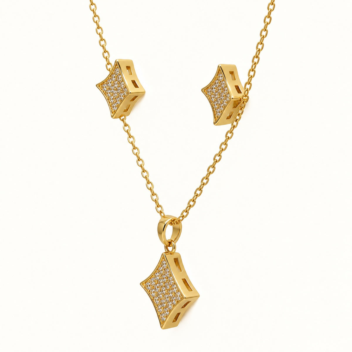Side view of Pavé Rhombus Necklace Set showing the pendant profile and earring posts