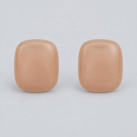 Front view of peach blush cushion cabochon stud earrings