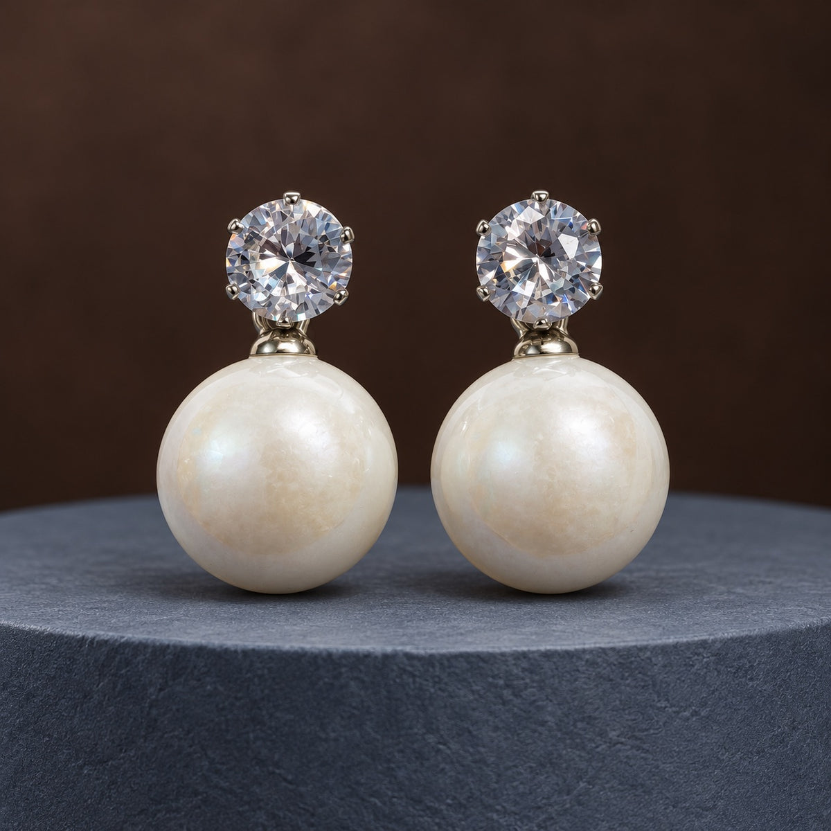 Pearl White Lustre Orb Drop Earrings in silver tone with zirconia studs on marble