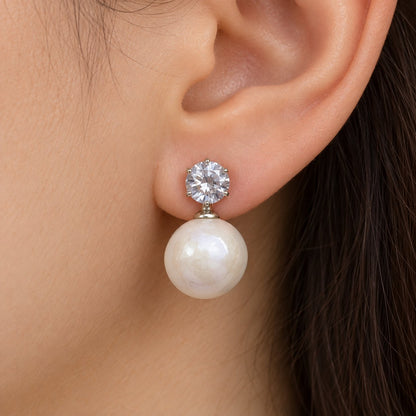 Model wearing Pearl White Lustre Orb Drop Earrings