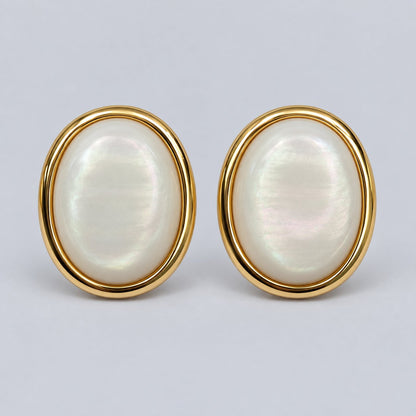 Front view of gold-tone pearlescent oval dome stud earrings