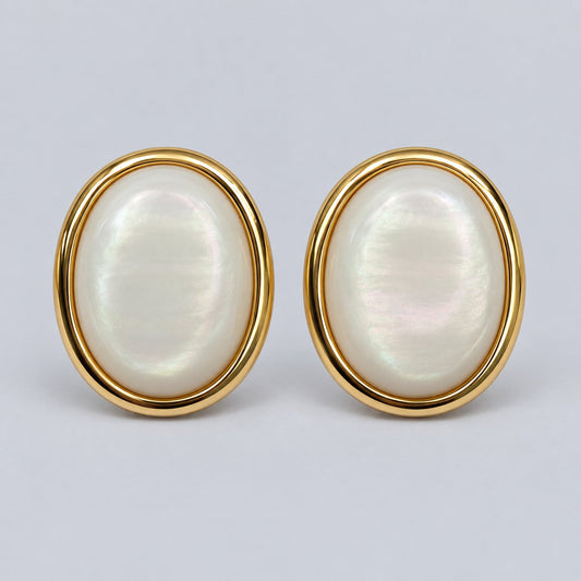 Front view of gold-tone pearlescent oval dome stud earrings