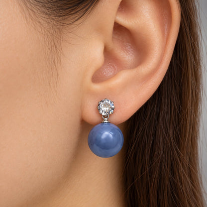 Model wearing Periwinkle Blue Lustre Orb Drop Earrings