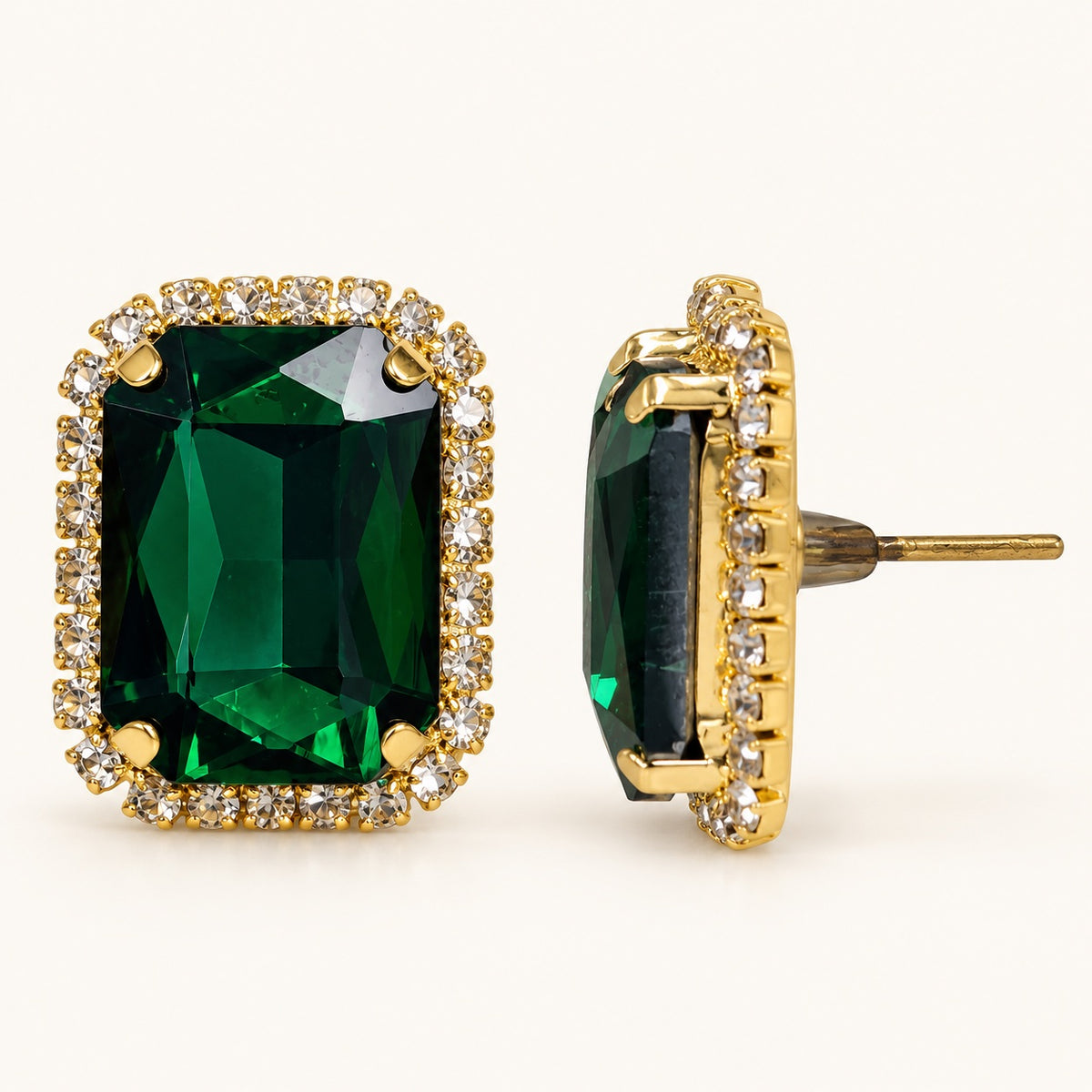 Side view of Regal Emerald Green Halo Studs showing the claw setting and push-back post