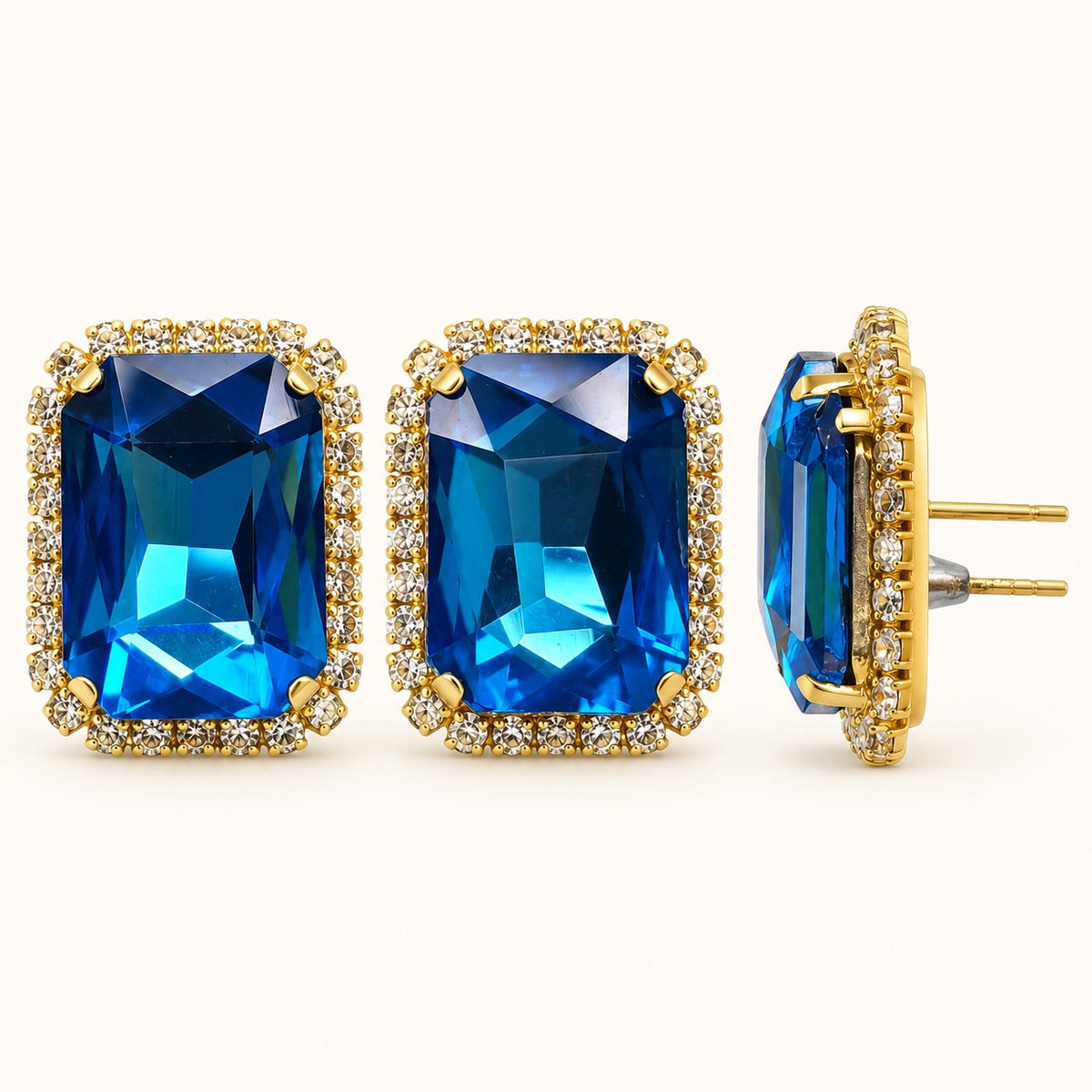 Side view of Regal Ocean Blue Halo Studs showing the claw setting and push-back post