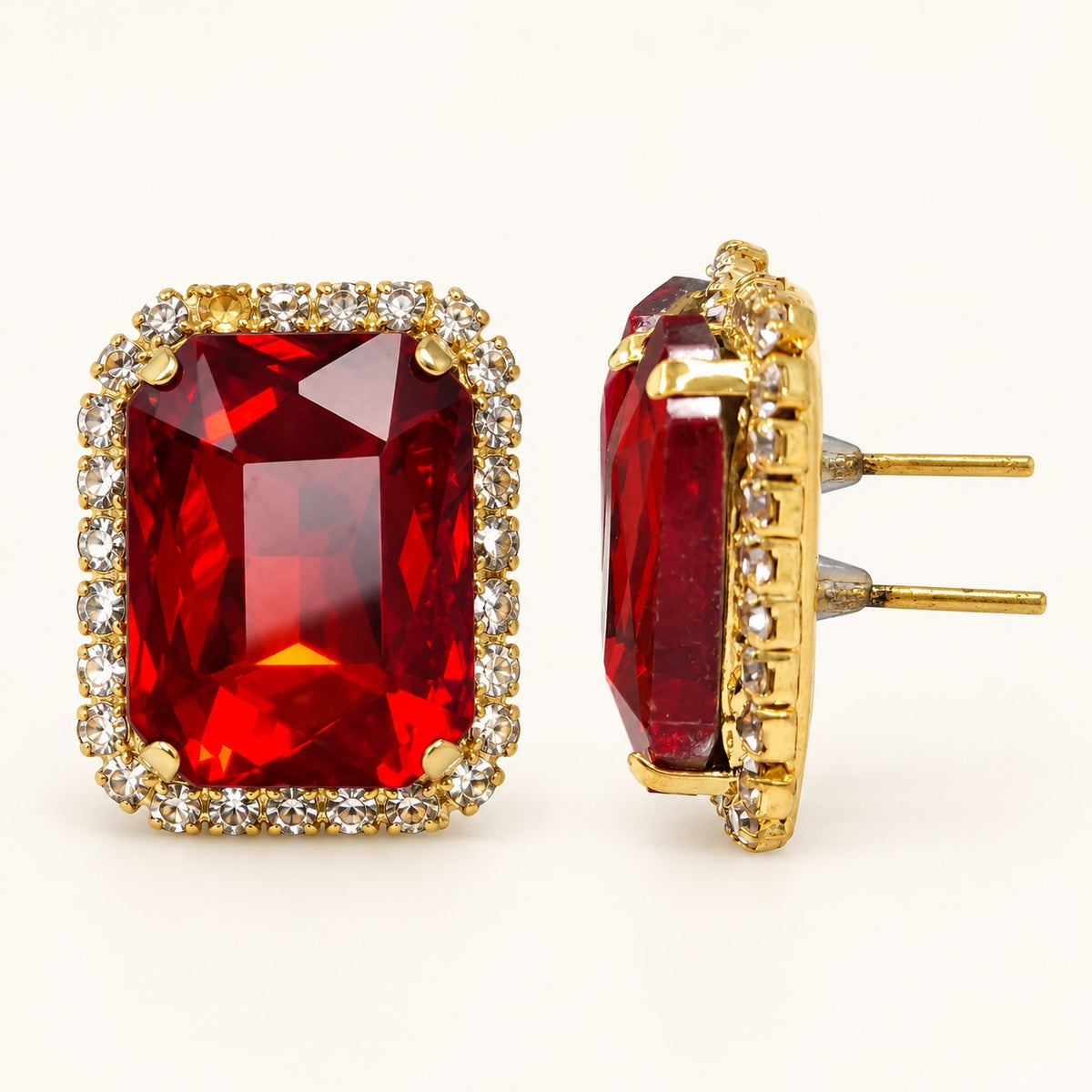 Side view of Regal Ruby Red Halo Studs showing the claw setting and gold-tone posts