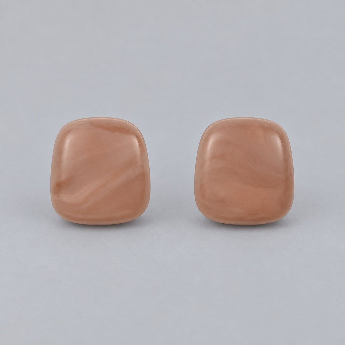 Front view of rose petal cushion cabochon stud earrings