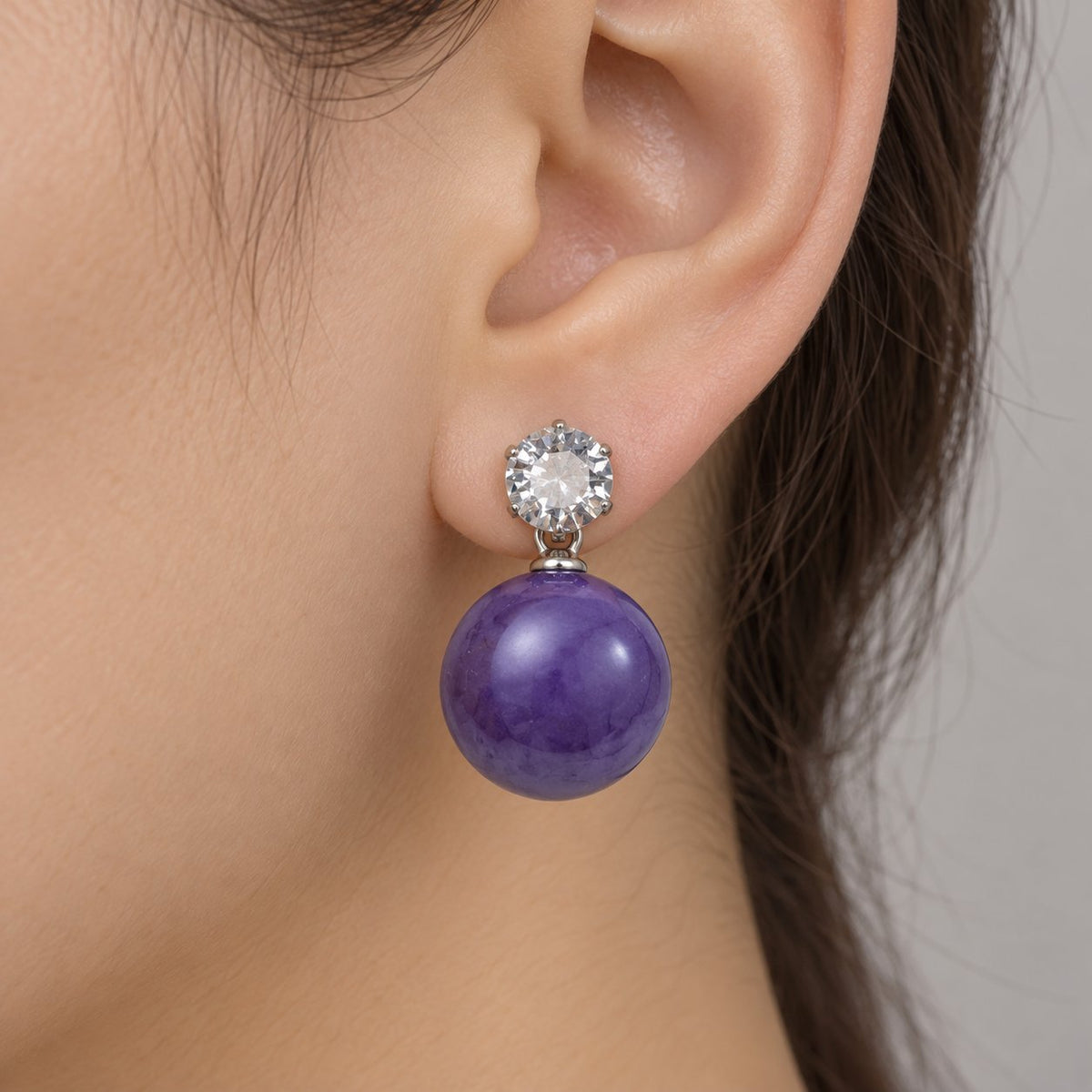 Model wearing Royal Purple Lustre Orb Drops silver-tone earrings