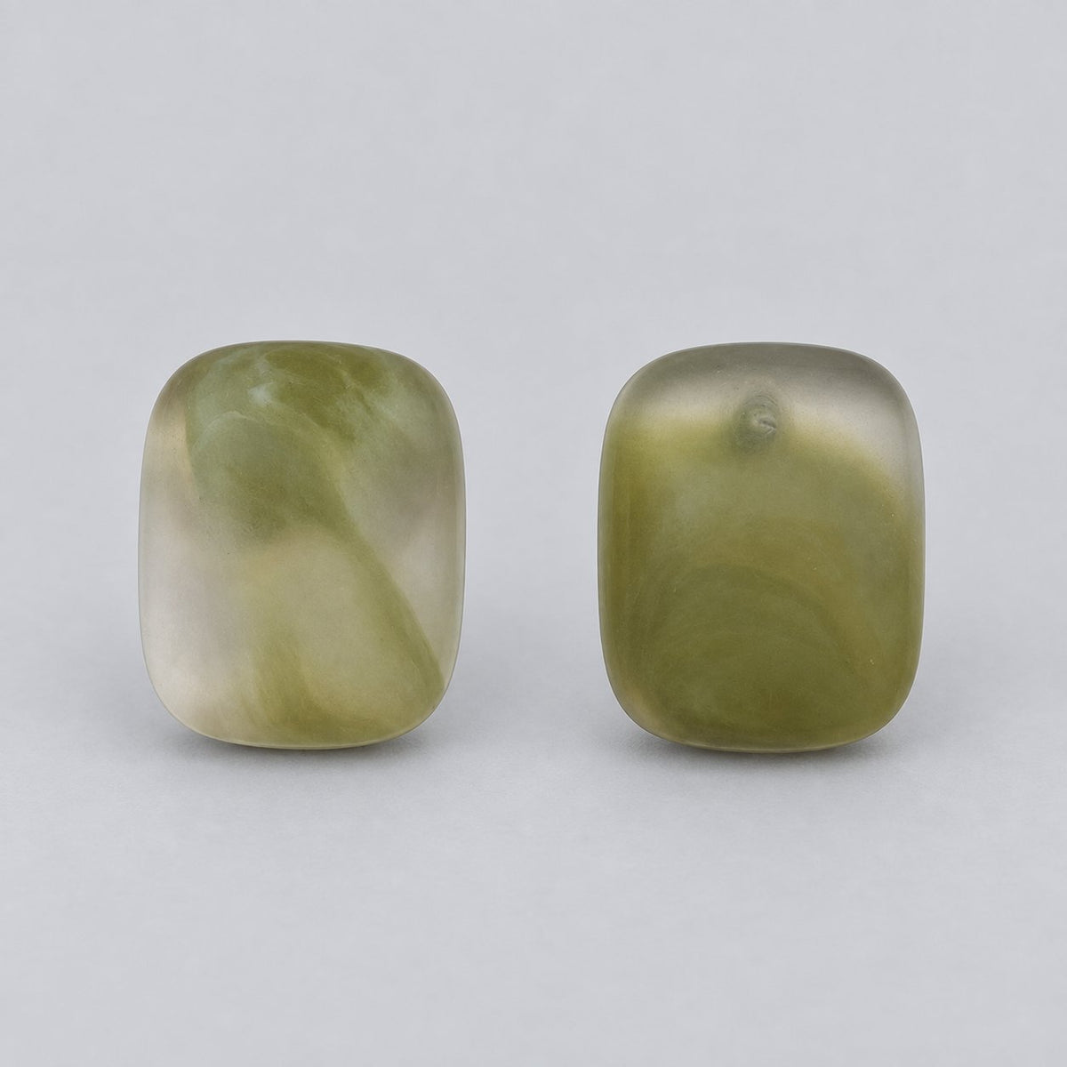 Front view of sage mist cushion cabochon stud earrings