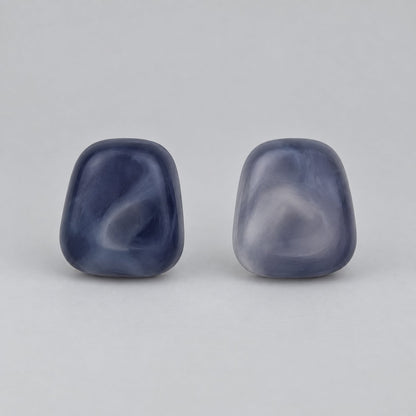 Front view of twilight blue cushion cabochon stud earrings