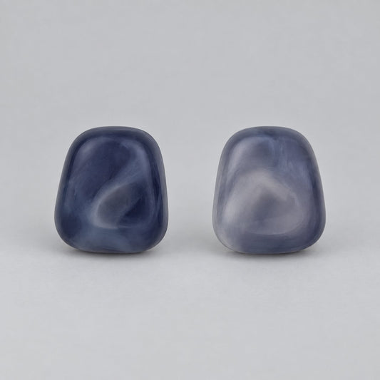 Front view of twilight blue cushion cabochon stud earrings