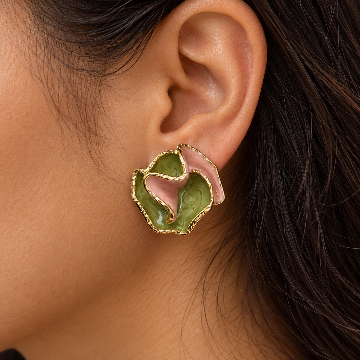 Model wearing Verdant Rose Enamel Studs gold-tone stud earrings
